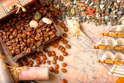 Image of middle-aged coffee beans. Poured into a pirate chest. Precious, expe Stock Photos