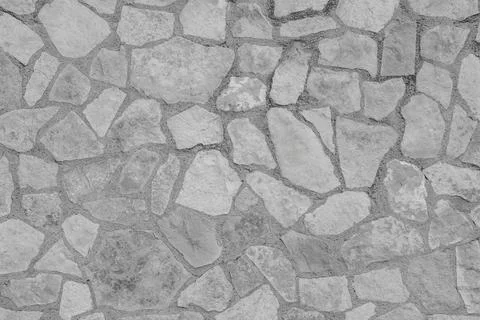 Image of mortared stone wall in rural environment Stock Photos