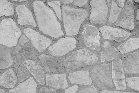 Image of mortared stone wall in rural environment Stock Photos