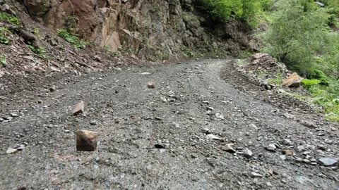 The image moving from the ground on the stony road. Stock-Footage 156528822