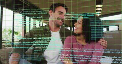 Image of multicolored computer language over diverse couple looking at each.. Stock Photos