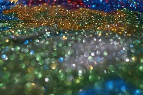 Image of multicoloured glitter with bokeh effect Stock Photos