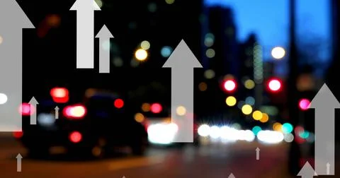 Image of multiple up arrows over blurred vehicles moving on street in city Stock Photos