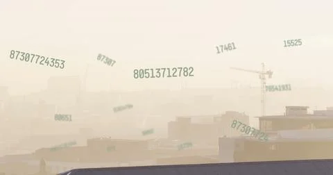 Image of multiple changing numbers floating against aerial view of cityscape Stock Photos
