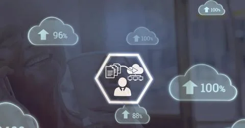 Image of multiple clouds icons over caucasian senior woman talking on smartphone Stock Photos