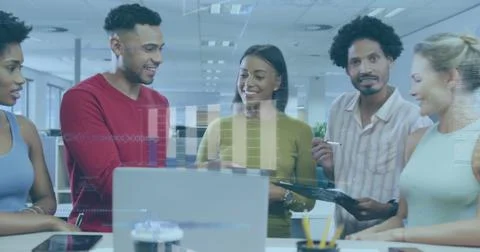 Image of multiple graphs and computer language, diverse coworkers discussing in Stock Photos