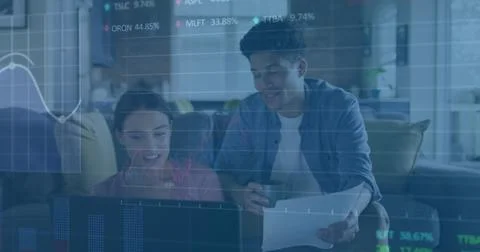 Image of multiple graphs and trading board over diverse couple checking expenses Ilustração Stock