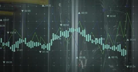 Image of multiple graphs with changing numbers over data server room 스톡 사진