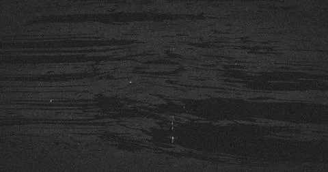 Image of multiple grey splashes moving on seamless loop on grey background Illustrazione stock