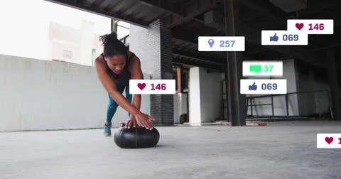 Image of multiple notification bars over african american woman doing push ups Stock Photos
