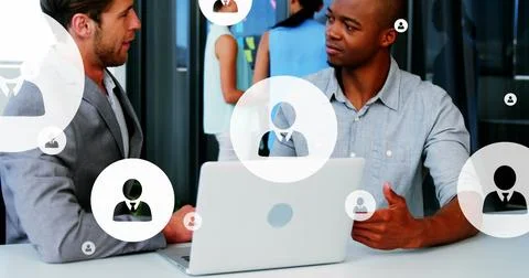 Image of multiple profile icons over diverse entrepreneurs sharing ideas in Stock Photos