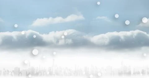Image of multiple white spots floating over clouds in the blue sky Foto stock