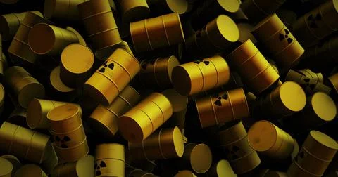 Image of multiple yellow barrels with black nuclear symbols Stock Photos