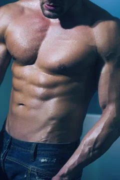 Image of muscle man posing in studio. Bodybuilding. Stock Photos