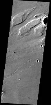 This image from NASA s 2001 Mars Odyssey spacecraft shows streamlined isla... Stock Photos