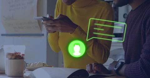 Image of neon profile and message icon against african american woman taking a Foto stock