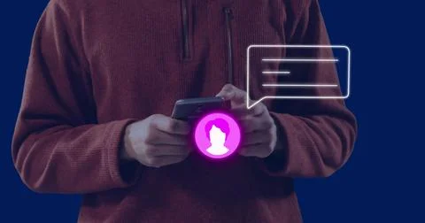 Image of neon profile and message icon against mid section of man using a Stock Photos