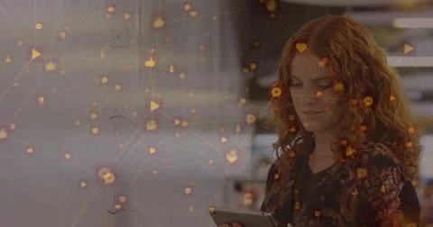 Image of network of connection with interface icons over Caucasian woman using Stock Photos