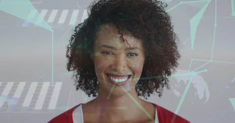 Image of network of connections with icons over biracial woman smiling at camera Stock Photos