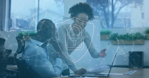 Image of network of connections with padlock over diverse businesspeople in 스톡 사진