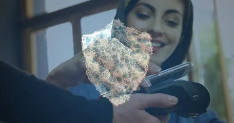 Image of network of connections with security shield over people using payment Foto stock