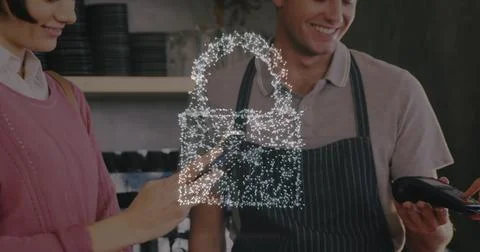 Image of network security padlock over people using payment terminal Foto stock