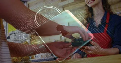 Image of network security padlock over people using payment terminal Foto stock