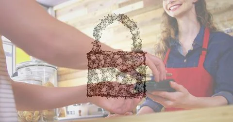Image of network security padlock over people using payment terminal Foto stock