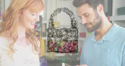 Image of network security padlock over people using payment terminal Stock Photos