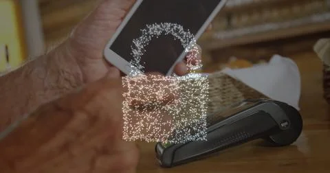 Image of network security padlock over people using payment terminal Foto stock