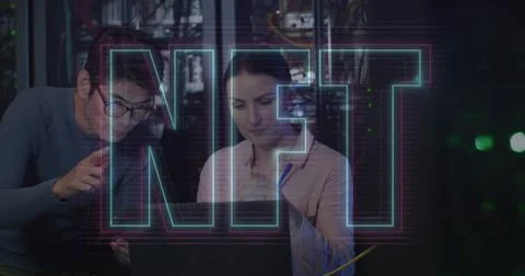 Image of nft and data processing over diverse it engineers by computer servers 写真素材