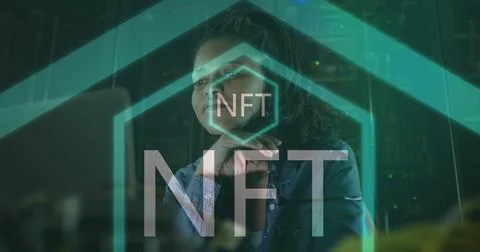 Image of nft text over african american female worker in server room 스톡 사진