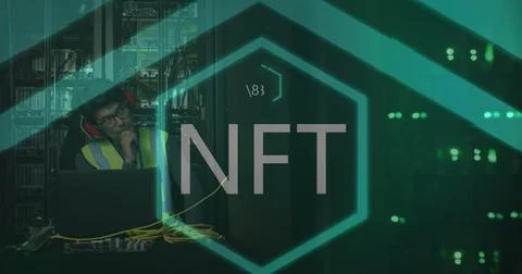 Image of nft text over asian male worker in server room 스톡 사진