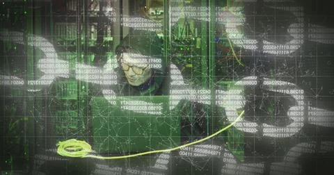 Image of nft text over asian male hacker in server room 스톡 사진