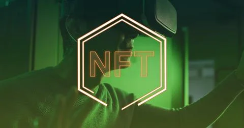 Image of nft text over asian male worker with vr headset in server room Stock Photos