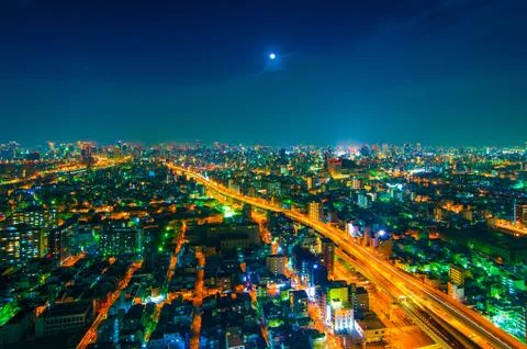 The image of the night city from the height of a bird's flight. Stock Photos
