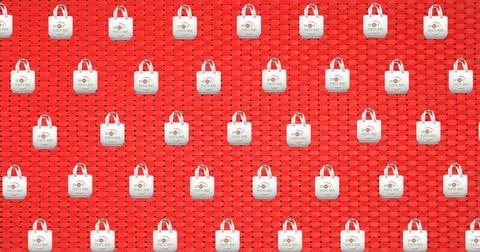 Image of no plastic bags text over bag icons on red background Stock Illustration