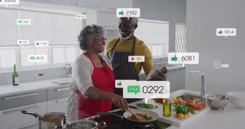 Image of notification bars over african american couple using digital tablet Fotos Stock
