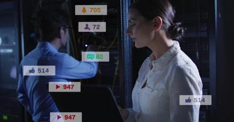Image of notification bars over diverse engineers checking data server syst.. Stock Photos
