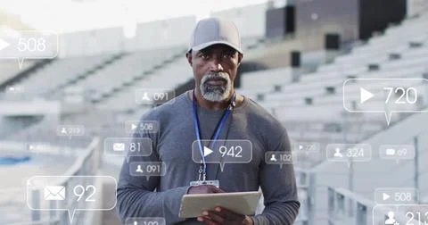 Image of notification icons with changing numbers over african american coach Stock Photos