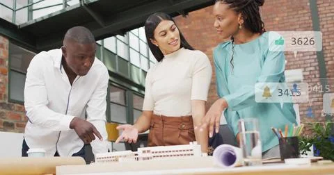 Image of numbers, icons in notification bars, diverse coworkers discussing Stock Photos