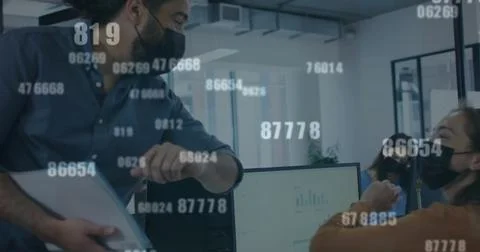 Image of numbers processing over business people in face masks touching elbows Foto stock