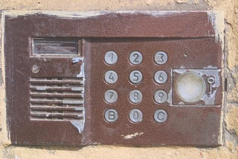 The image of the old intercom system in the entrance. Stock Photos