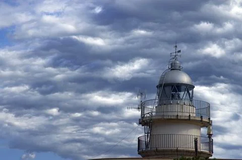 Image of the old oropesa lighthouse with a cloudy sky in the background Stock-Fotos