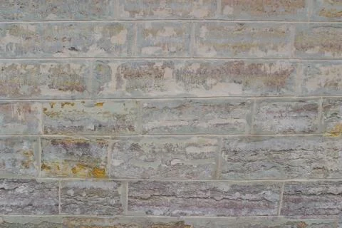 The image of an old stone wall close-up. Stock Photos