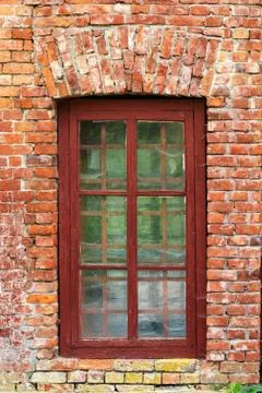 An image of old window on red brick wall Stock Photos