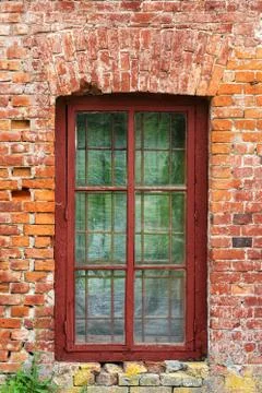 An image of old window on red brick wall Stock Photos