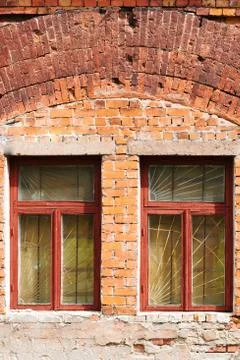 An image of old window on red brick wall Stock Photos