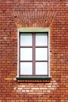 An image of old window on red brick wall Stock Photos
