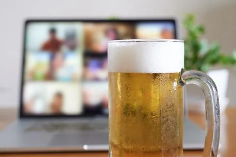 Image of an online drinking session using a computer Stock Photos